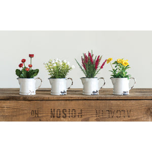 Faux Flowers in Distressed Pitchers
